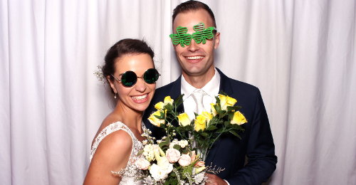 Bride and groom in a photobooth